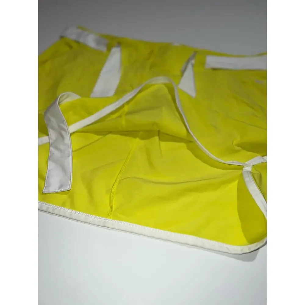 Nike golf tour performance dri-fit women’s yellow & white skirt